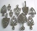 Miniature pair of cast iron trivets