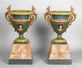 Pair of painted cast iron garden urns on stands late 19th c