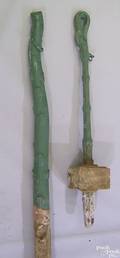Two cast iron stick form hitching posts 19th c