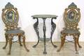 Pair of cast iron garden chairs late 19th c