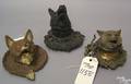 Two cast iron fox head inkwells