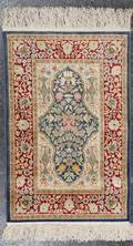 A Persian Silk and Wool Mat