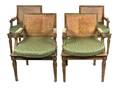 A Set of Four Louis XVI Style GreenPainted and ParcelGilt Fauteuils