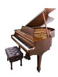 A Steinway  Sons Baby Grand Piano
