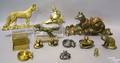 Thirteen cast brass and white metal fox figures and desk accessories