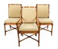A Set of Twelve Rattan Dining Chairs