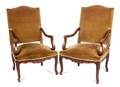 A Pair of Victorian Carved Walnut Open Armchairs
