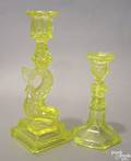 Two vaseline glass candlesticks