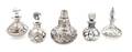 A Group of Five Silver Overlay Glass Bottles