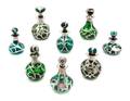 A Group of Eight Silver Overlay Glass Bottles